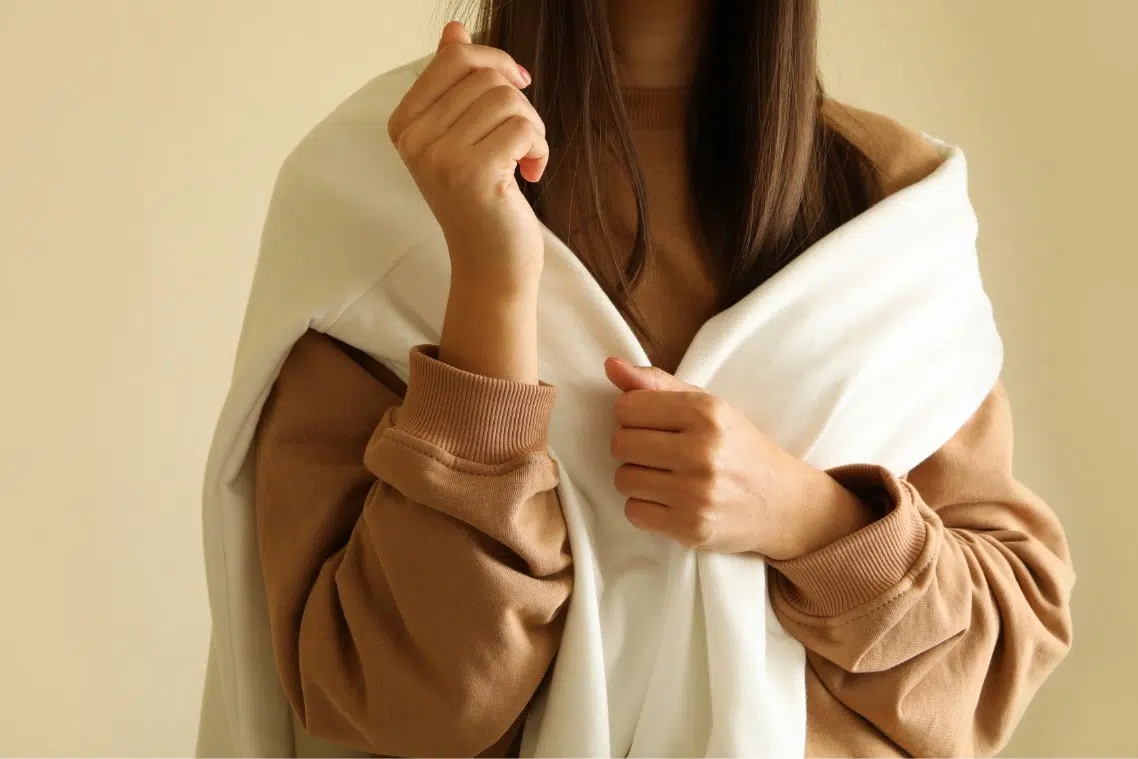 woman in stylish sweatshirts on beige background 2021 08 31 15 09 00 utc